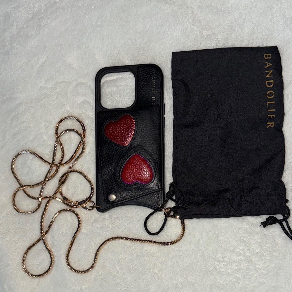 Bandolier iPhone 15 pro case, Black Case with Red Heart Accents